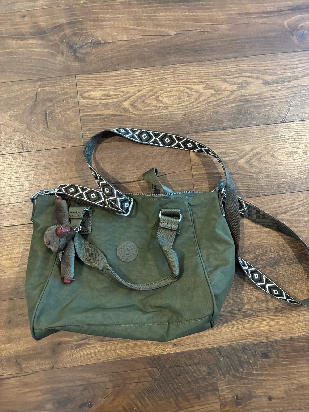 Kipling Amiel Olive Green Crossbody Tote with Patterned Strap